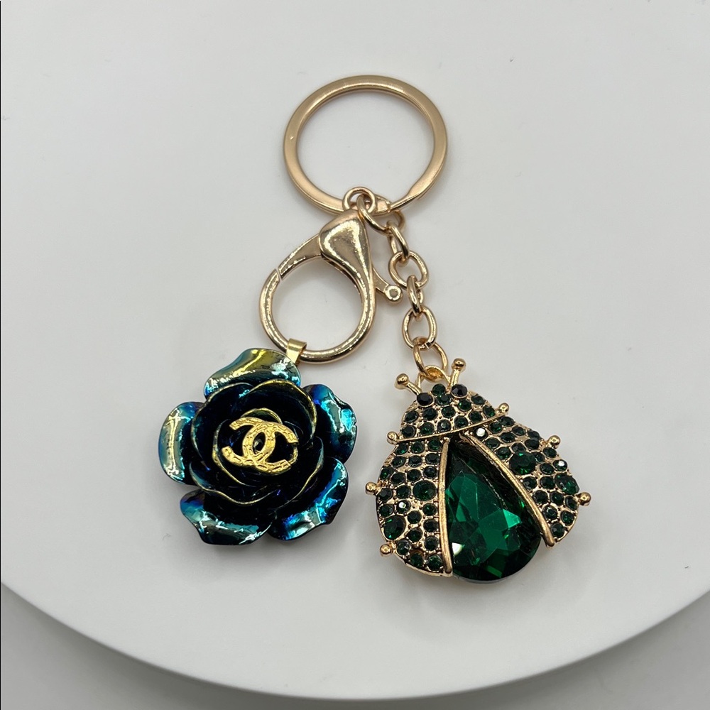 1432. Designer Gold and Green Keychain - Picture 1 of 3